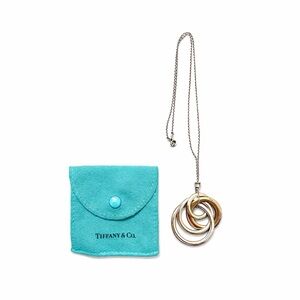 Tiffany
1837 Tiffany&Co 
4 interlocking circles 
Pendant Rubedo/Sterling Silver
